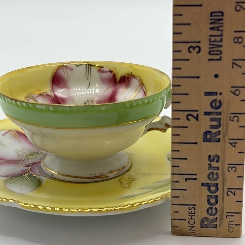 VINTAGE DAINTY LITTLE YELLOW AND PINK FLORAL TEACUP AND SAUCER